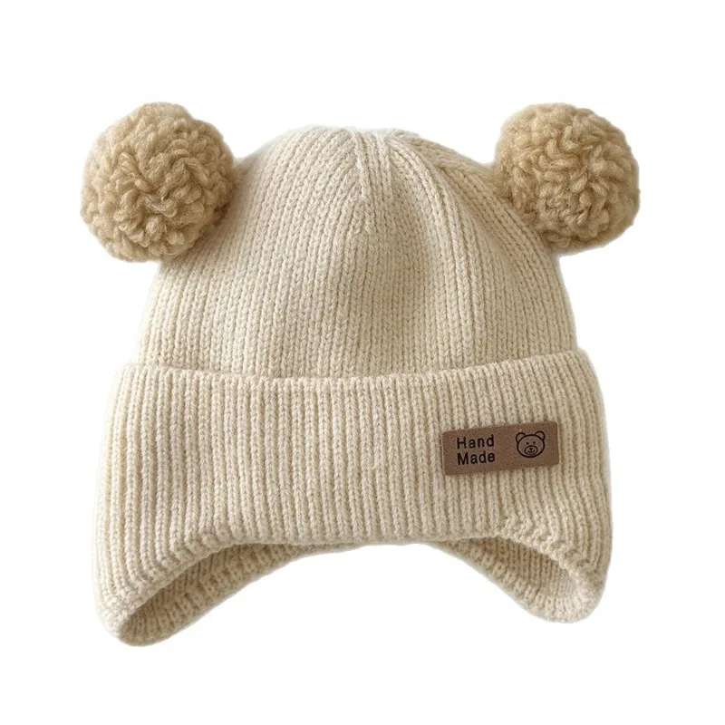 Gorro de bebé con orejeras de lana tejido y animales para invierno - imagen 2