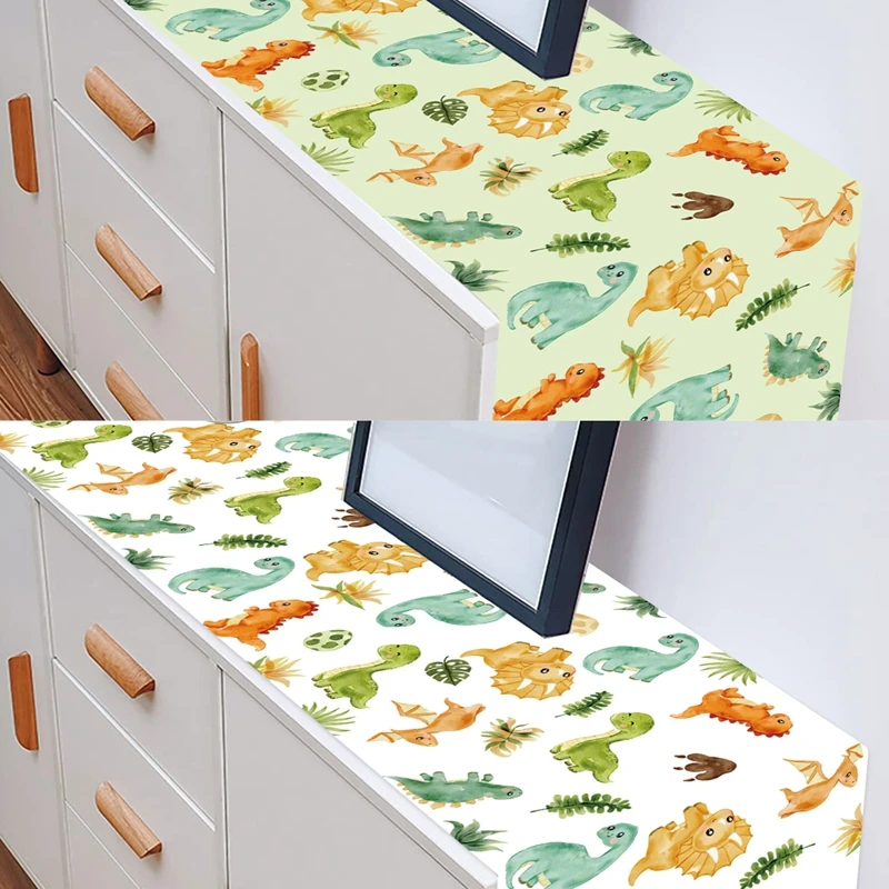 Decoración temática Jurassic World con dinosaurios verdes y marrones
