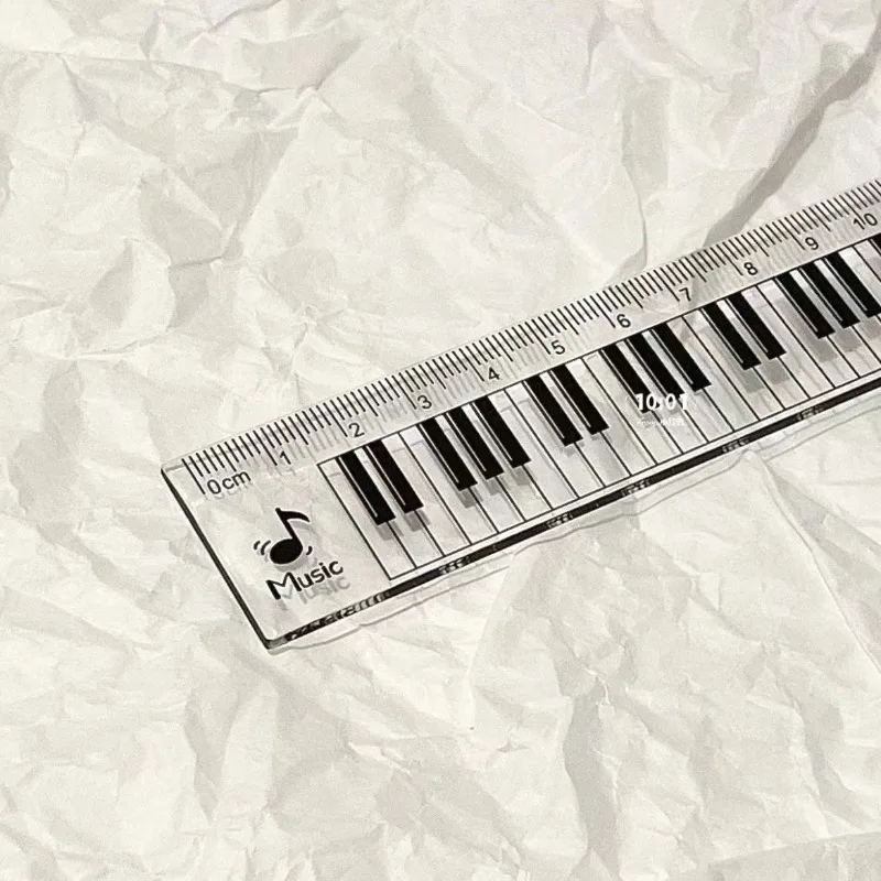 Juego de reglas transparentes escolares con diseño piano - imagen 3