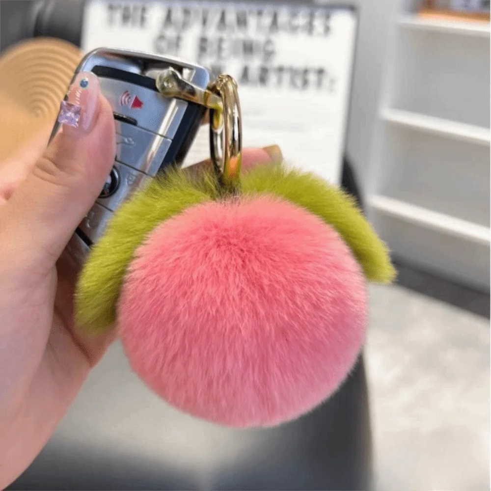 Fruitthema llavero de peluche melocotón rosa suave, estilo tierno