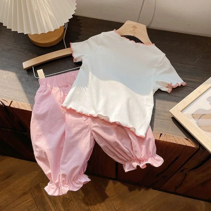 Conjunto de niña top y pantalón manga corta con estampado de dibujos - imagen 4