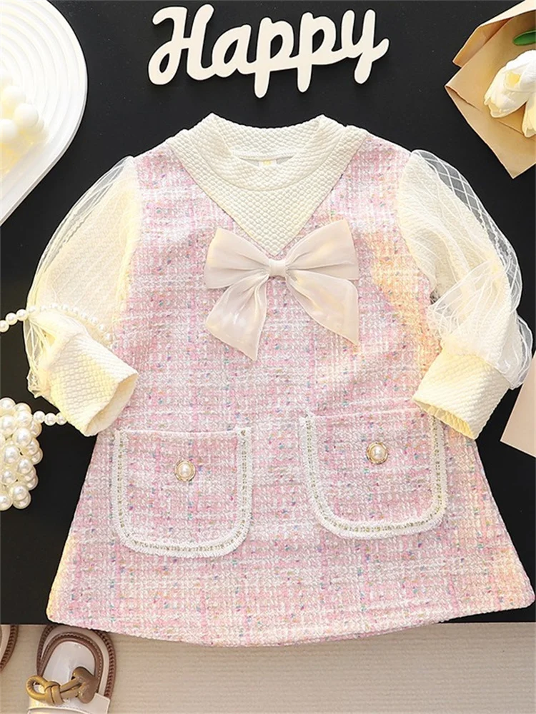 Vestido de princesa con lazo en tono rosa