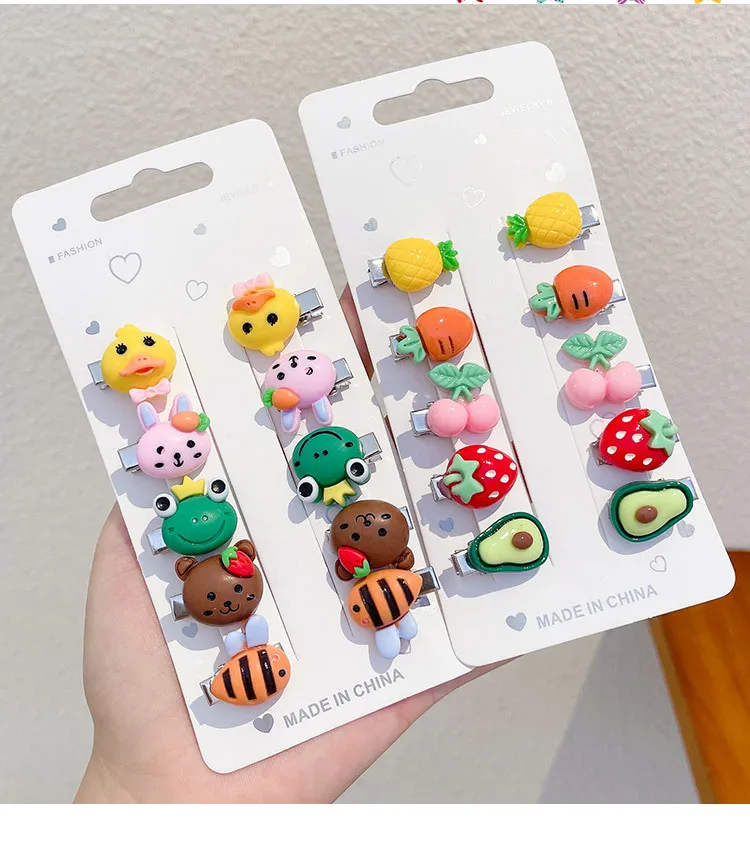 Conjunto de pinzas con dibujos animados para niña