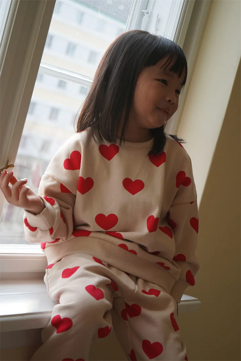 Chaqueta con lentejuelas y jersey de dibujos animados
