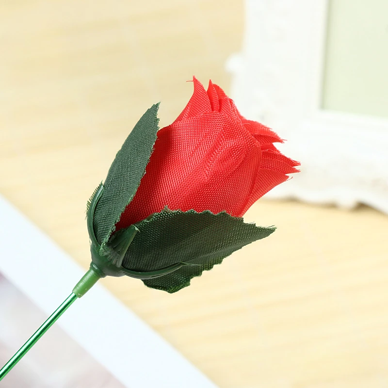 Truco de magia antorcha con llama que cambia a rosa para San Valentín