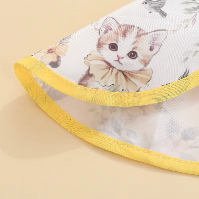 Babero de alimentación impermeable con bolsillo y animales - imagen 2
