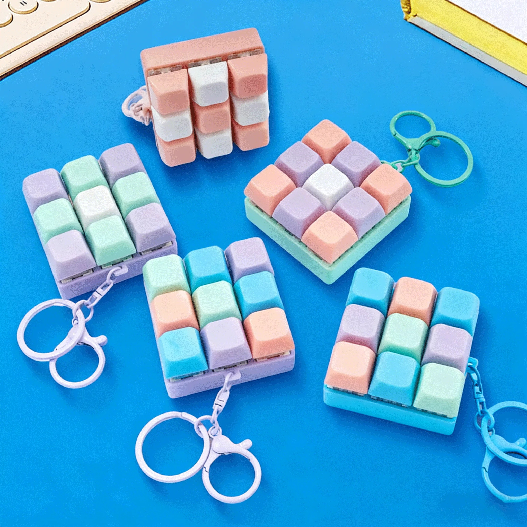 Teclado antiestrés de botones con llavero para niños y adultos