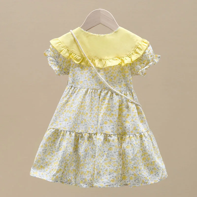 Vestido floral amarillo niña