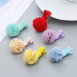 Bola de gasa roja para el pelo del bebé con horquilla textil