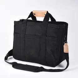 Bolso de mamá con compartimentos en lona para bebé y pañales