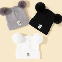 Gorro de lana de invierno para bebé con pompón y color liso unisex