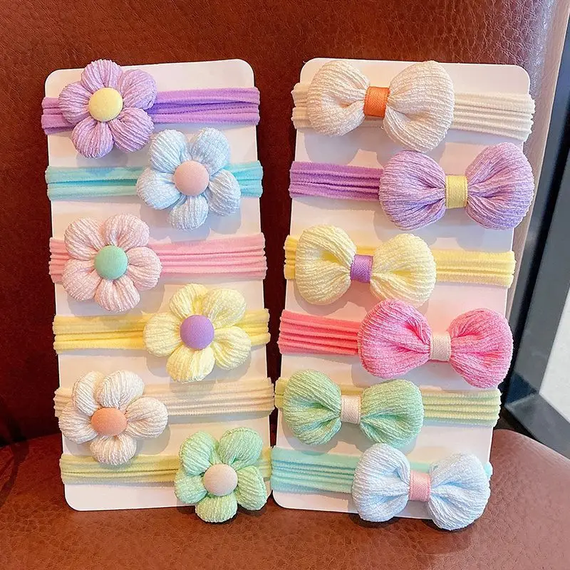 Paquete de bandas elásticas con flores en tonos rosa y azul