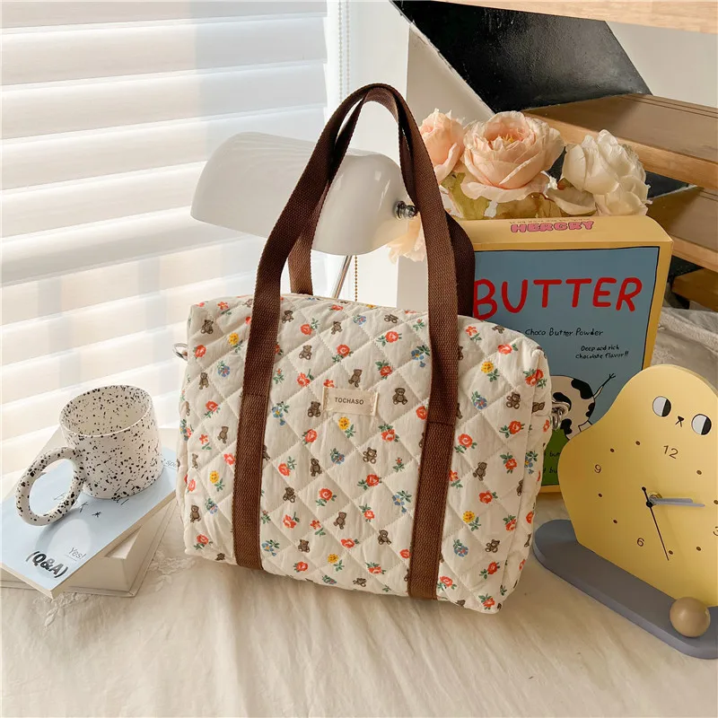 Bolsa de pañales con diseño kawaii para bebé | Porta-pañales práctica