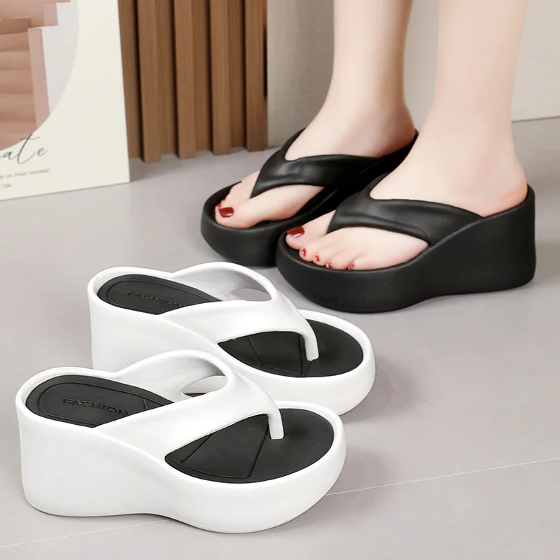 Sandalias de cuña EVA negras con detalle frontal