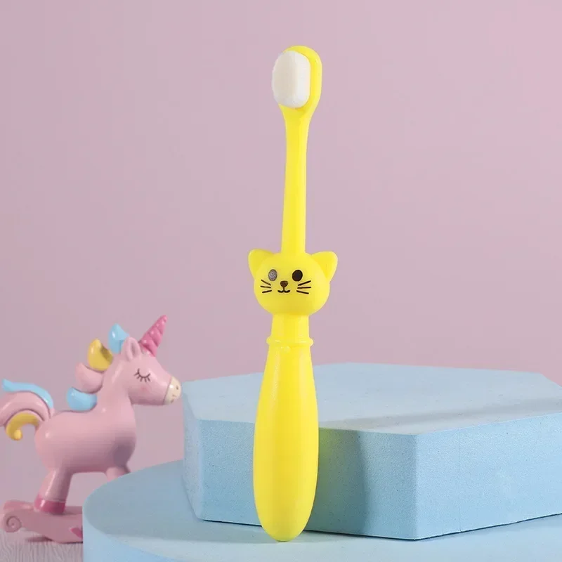 Cepillo dental infantil forma gato cerdas suaves para niños - imagen 5