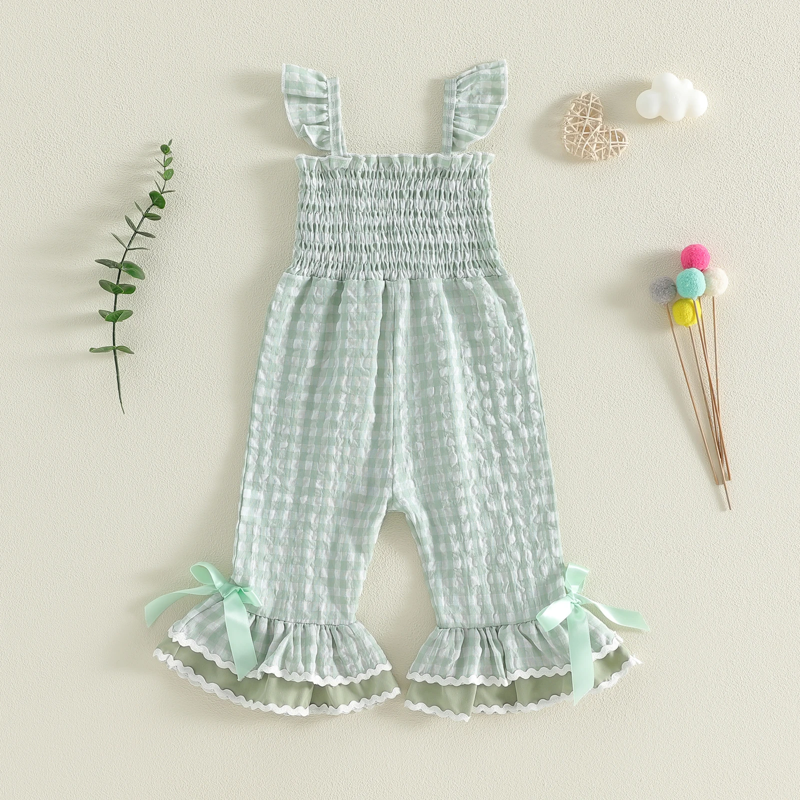 Mono bebé niña con cuadros, volantes y pantalón acampanado