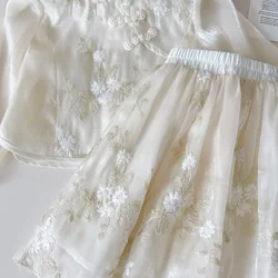 Conjunto de verano niña blusa de flores y falda tejida malla