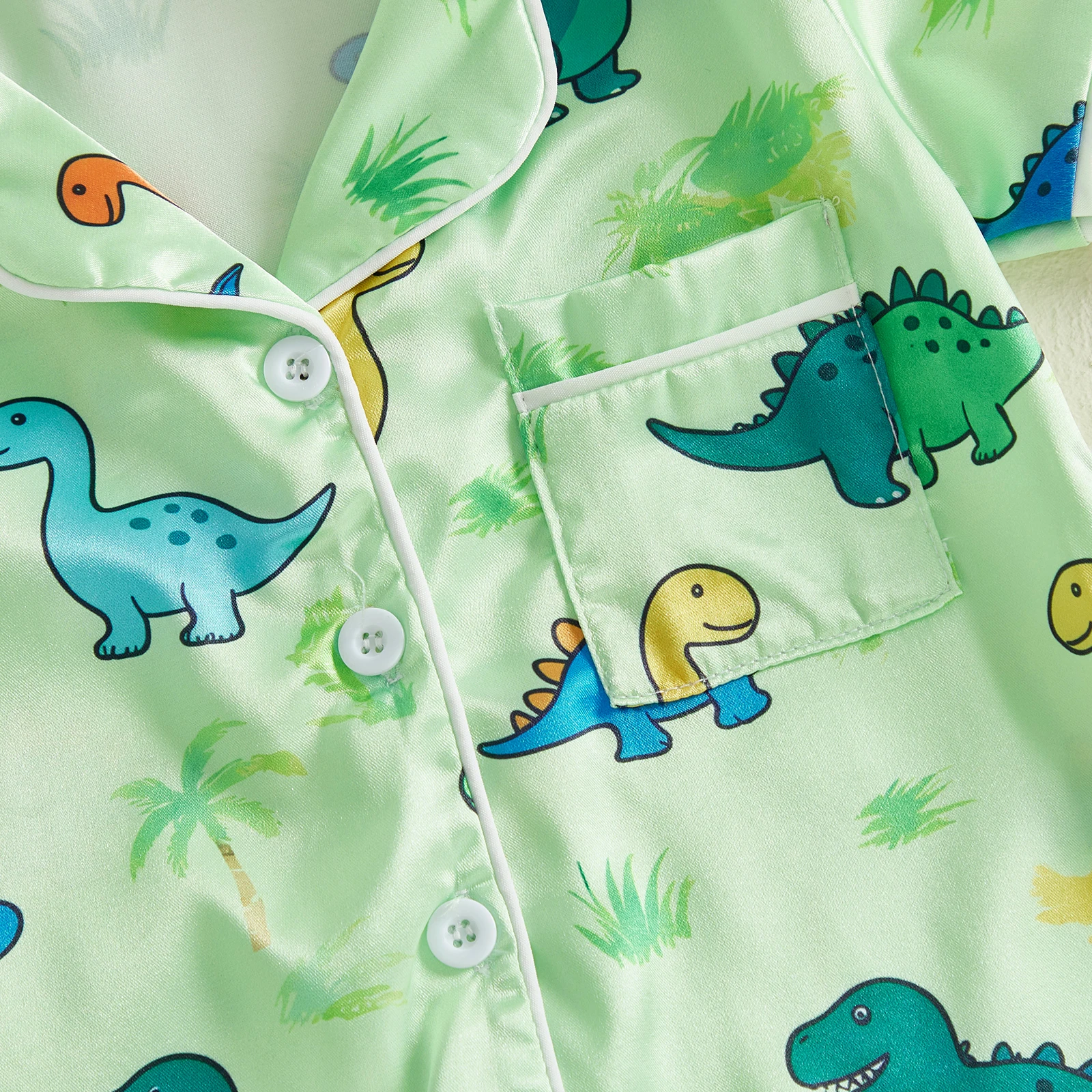 Pijama bebé con dinosaurios y cuello vuelto, manga corta - imagen 5