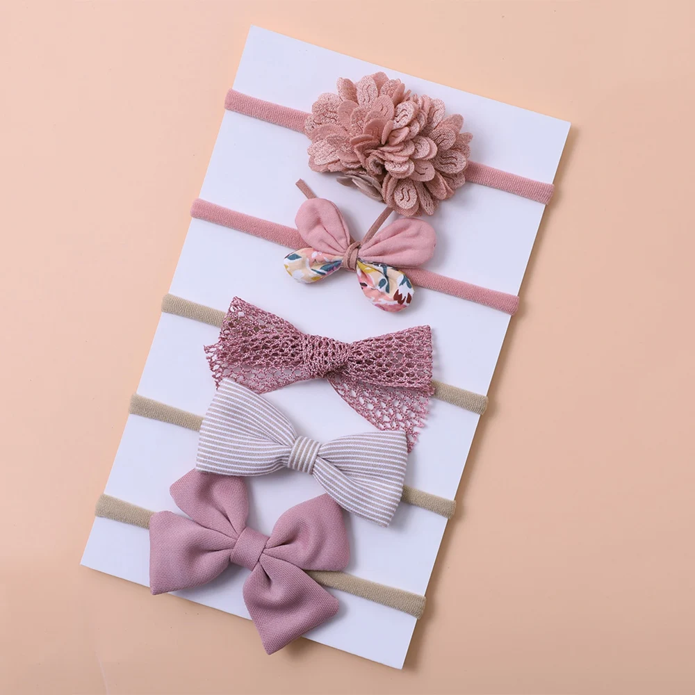 Diadema rosa de nailon para bebé recién nacido con lazo y flores