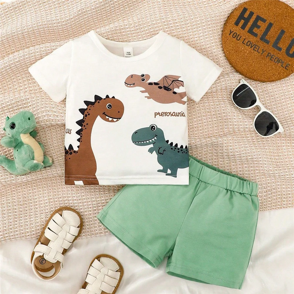 Conjunto deportivo bebé dinosaurios – Top blanco y pants marrón - imagen 2