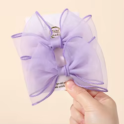 Horquillas con lazo de gasa rosa para niñas