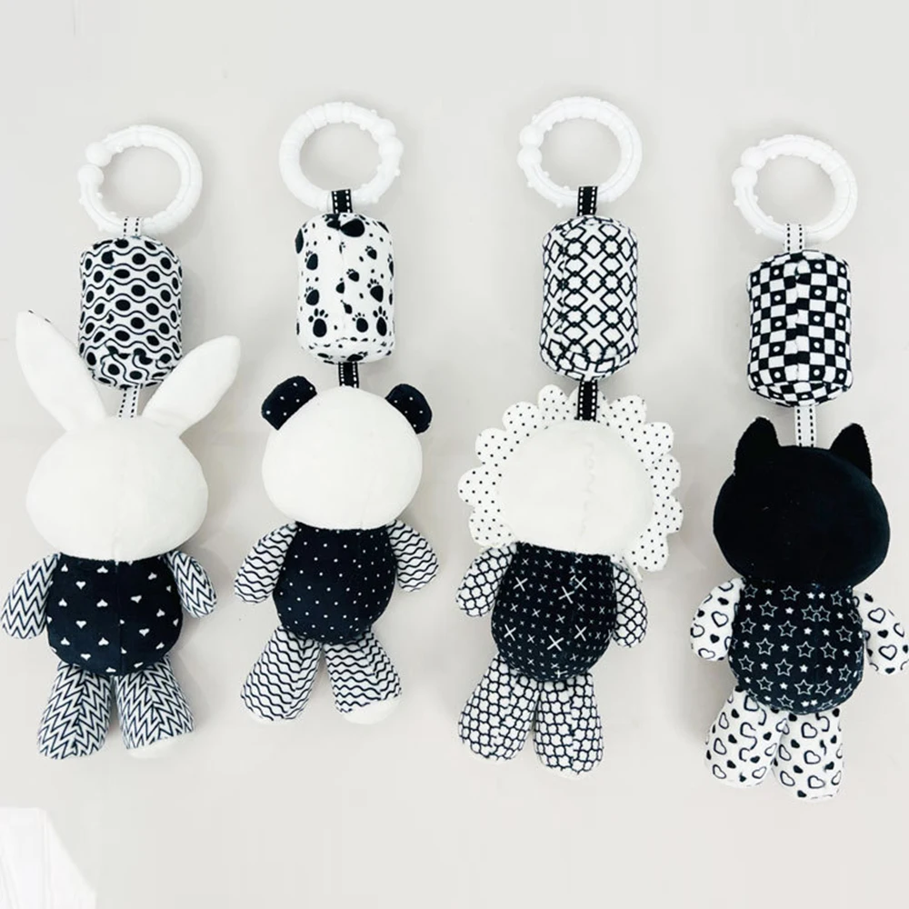 Juguete colgante de cuna: campana, peluche y sonajero para bebé