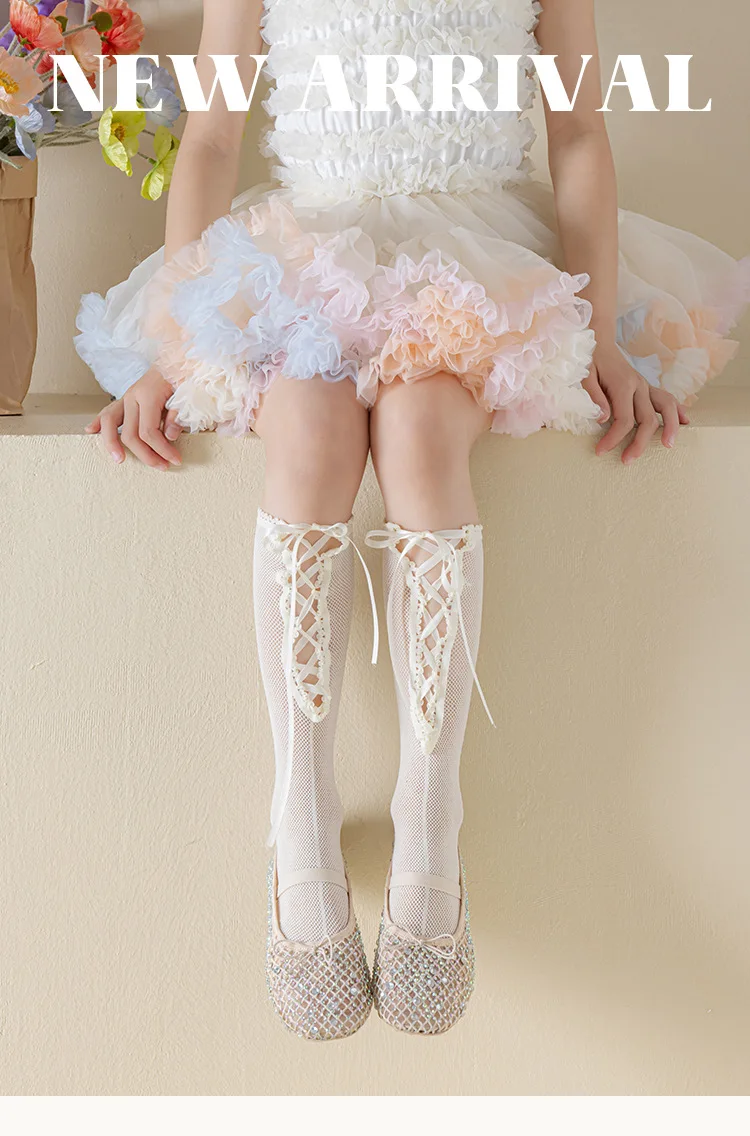 Calcetines altos de encaje rosa para niñas - vista frontal