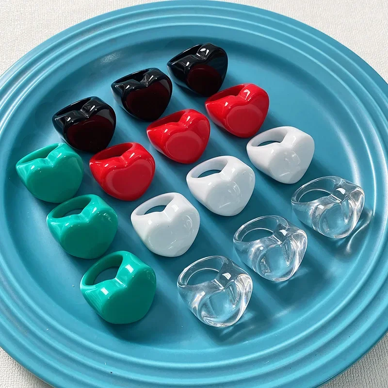 Anillos de corazón en resina acrílica para niña tono melocotón