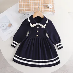 Vestido de punto para niña a rayas con lazo y perlas