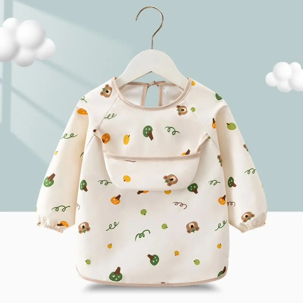 Babero impermeable infantil con bolsillo para comida y delantal - imagen 2