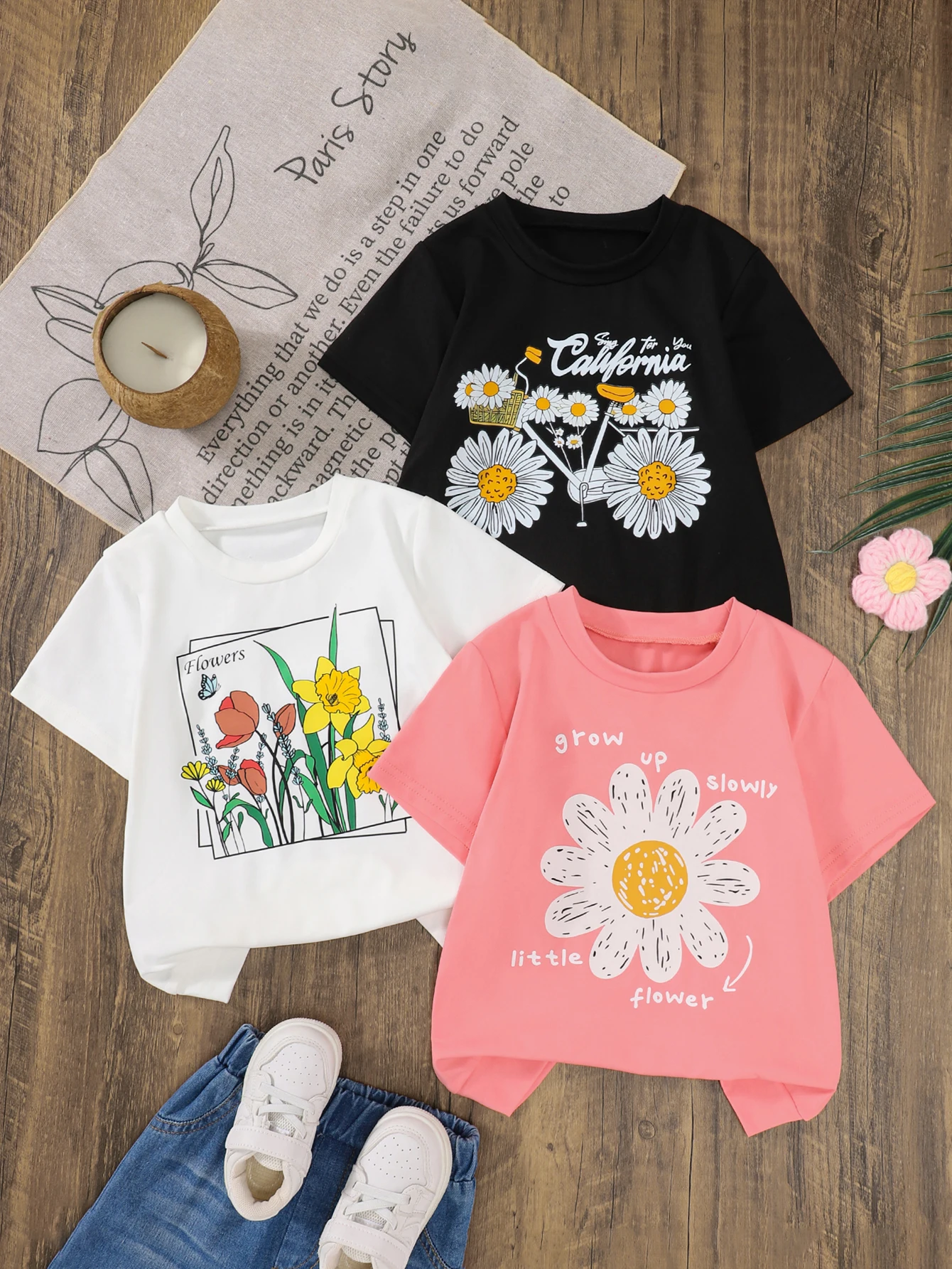 Camiseta de niña manga corta estampado floral cuello redondo