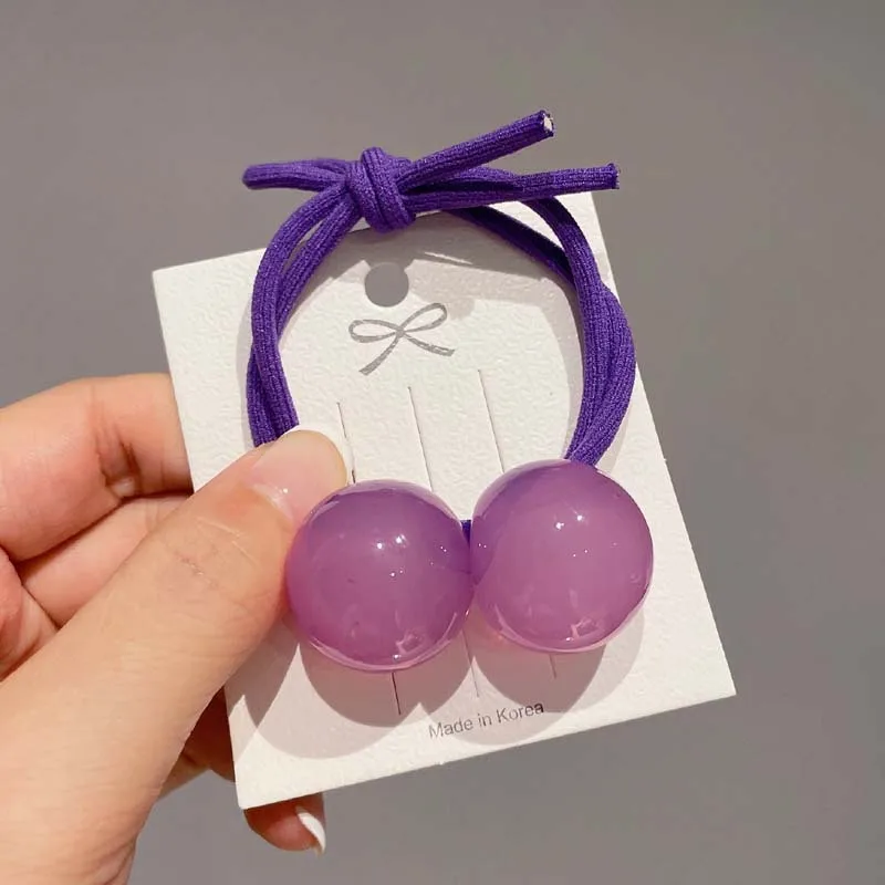 Detalle de bolas y lazo para un look primaveral