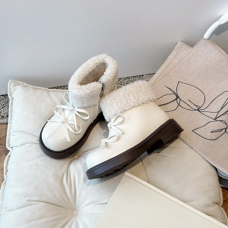 Botas de lana para niña con lazo – cálidas y cómodas