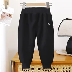 Pantalones deportivos de tela con bandas elásticas para niños
