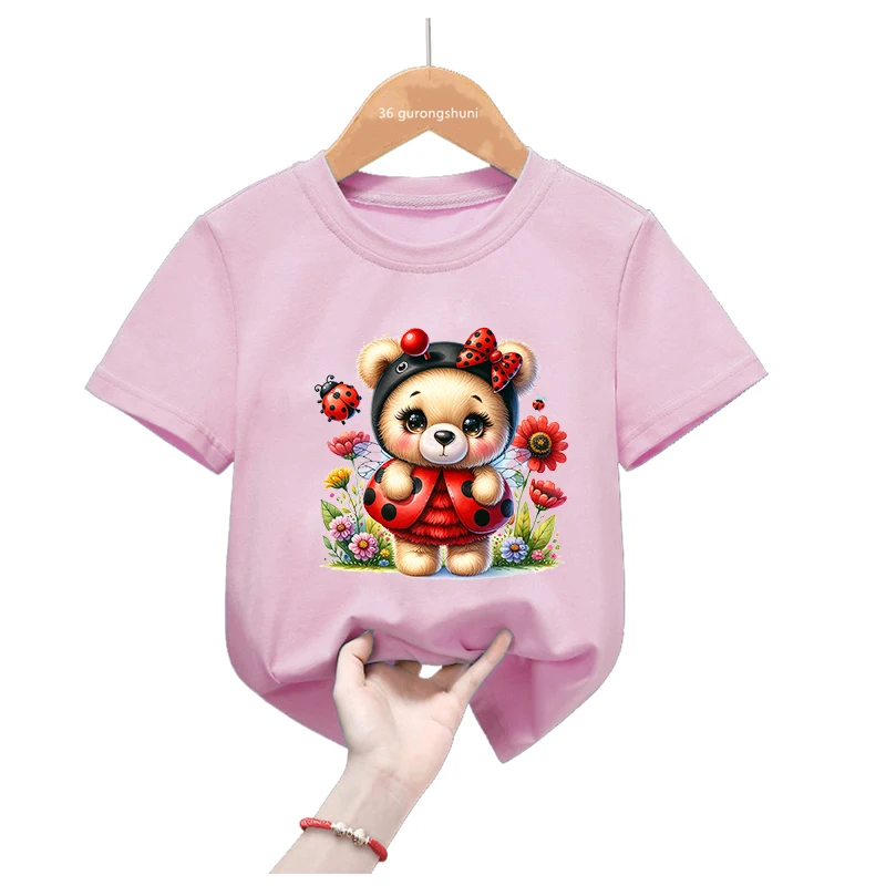 Camiseta rosa manga corta niña con mariquita y flores animales