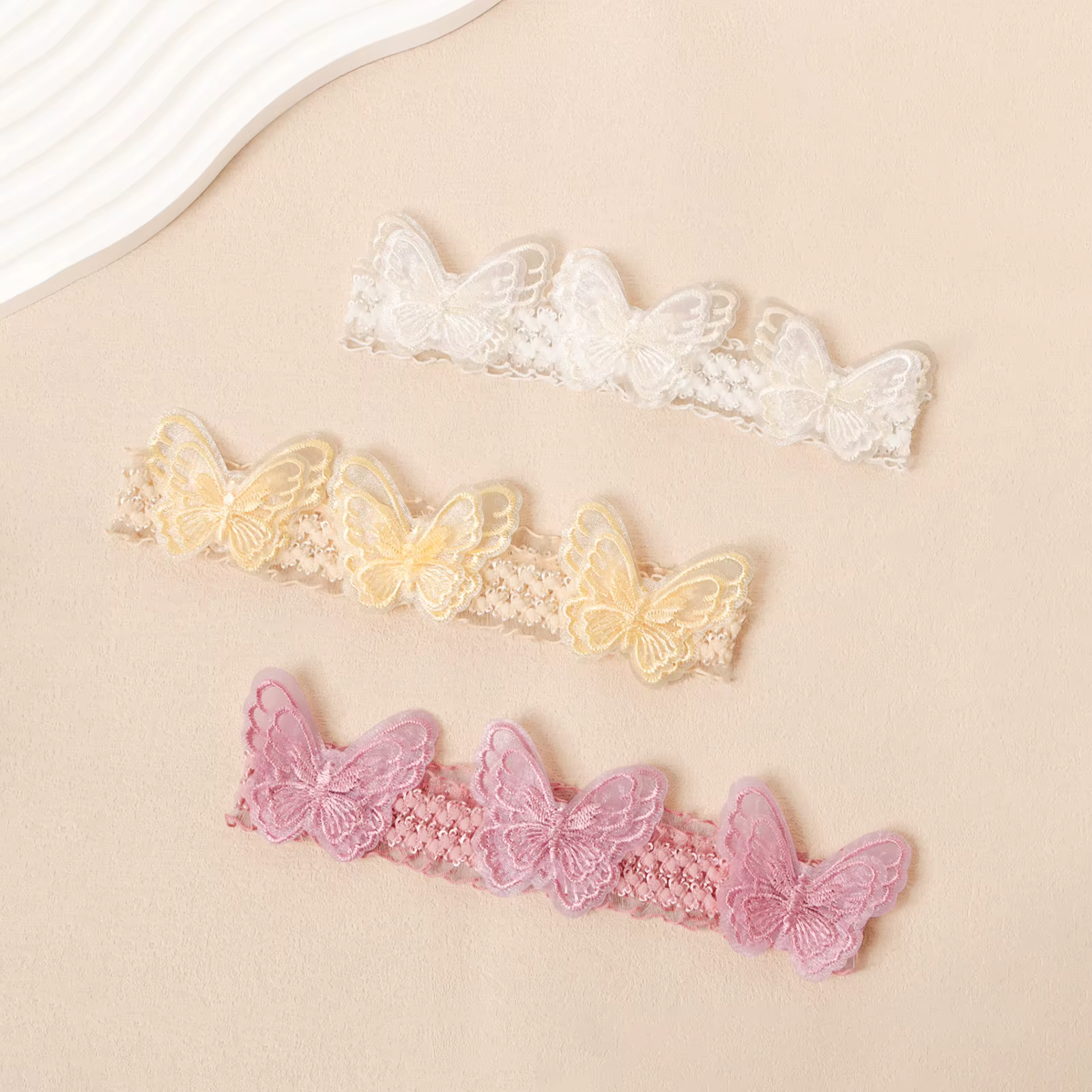 Diadema encaje suave para bebé con bordado mariposa