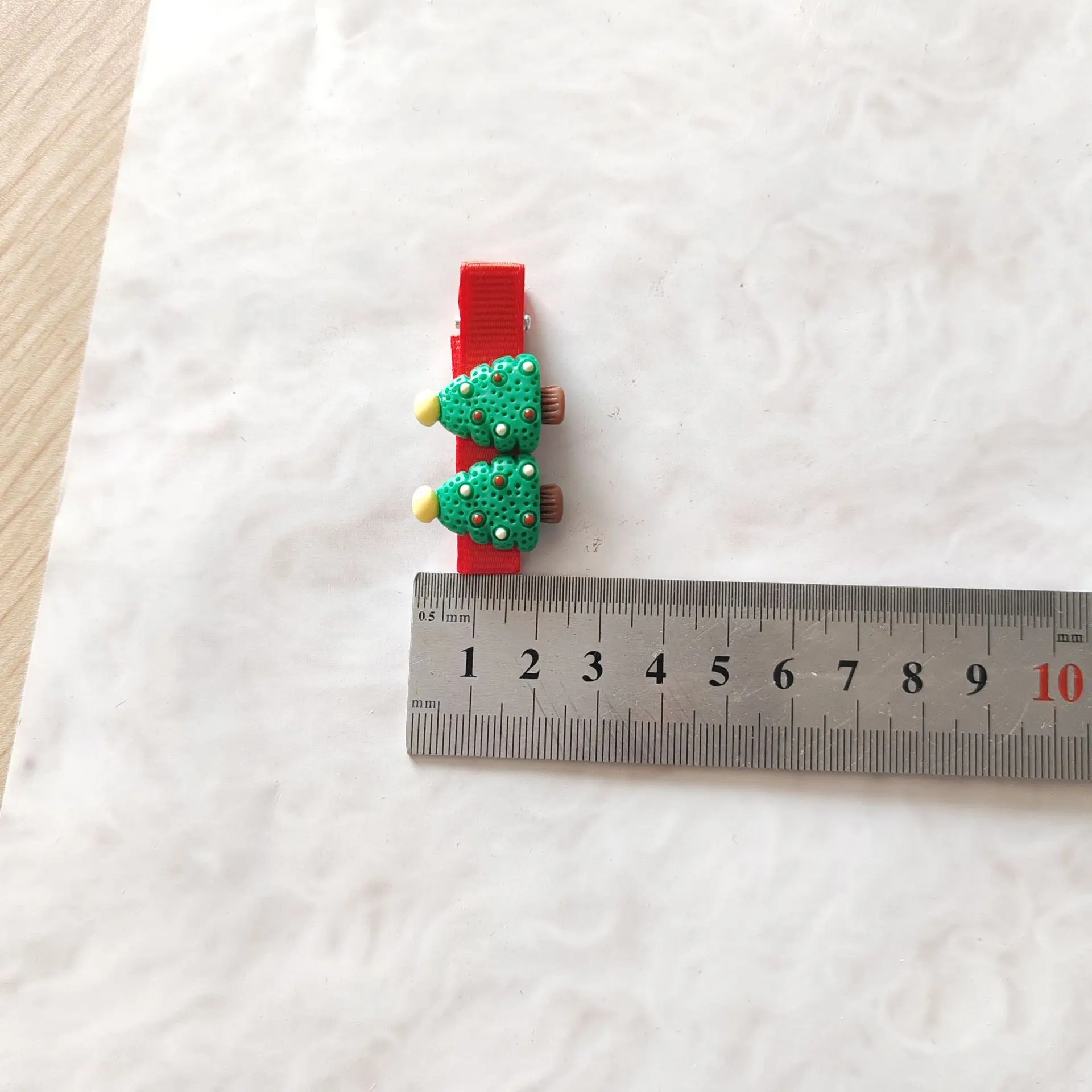 Pinzas y coleteros con temática de Navidad