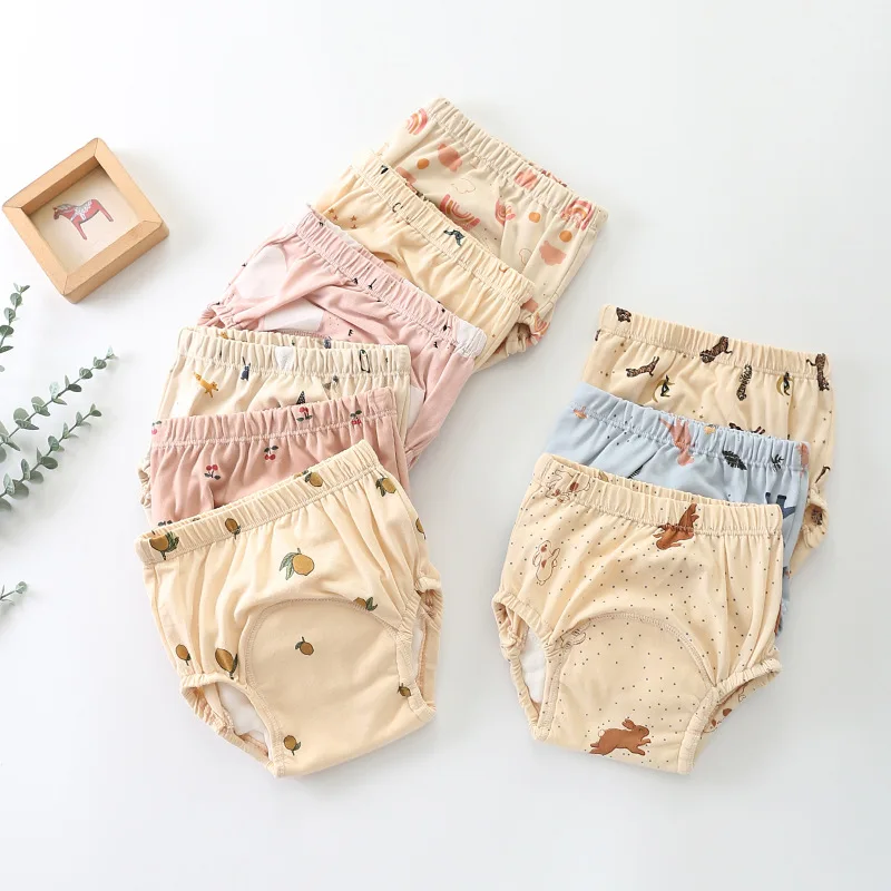 Pantalones de entrenamiento mostrando el tejido de algodón y las capas absorbentes