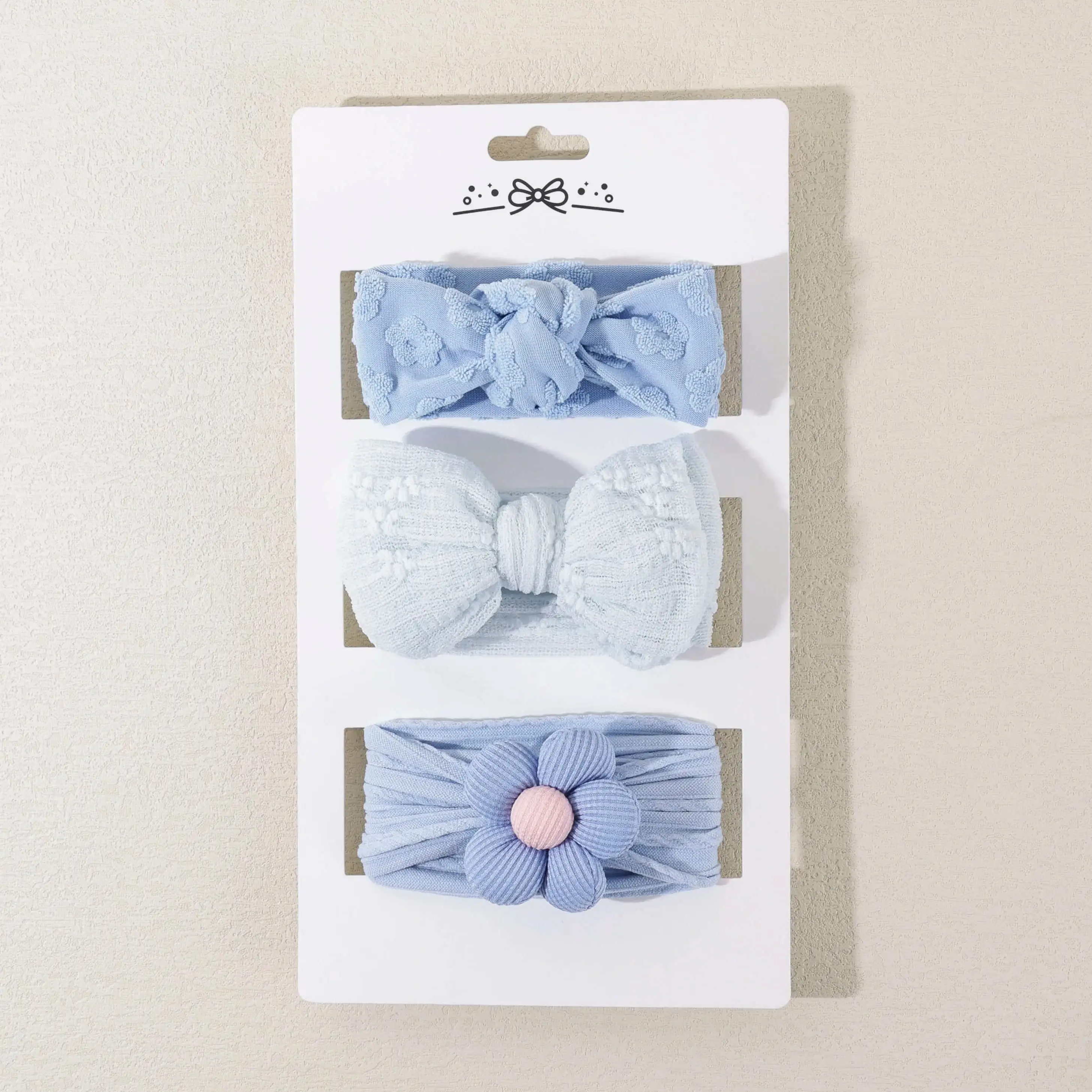Diademas suaves elásticas con lazo azul y flor para bebé