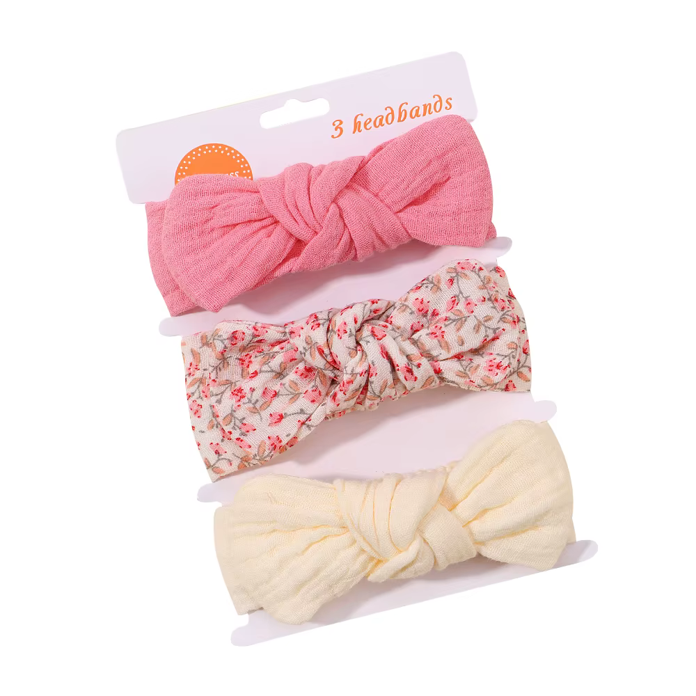Diademas con lazo en tonos pastel para bebé