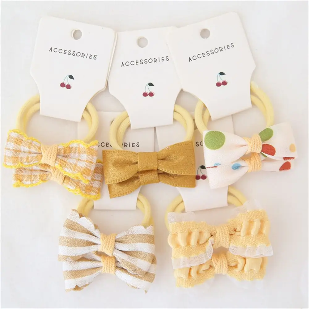 Bandas elásticas para el pelo de bebé – Lazos y scrunchies infantiles