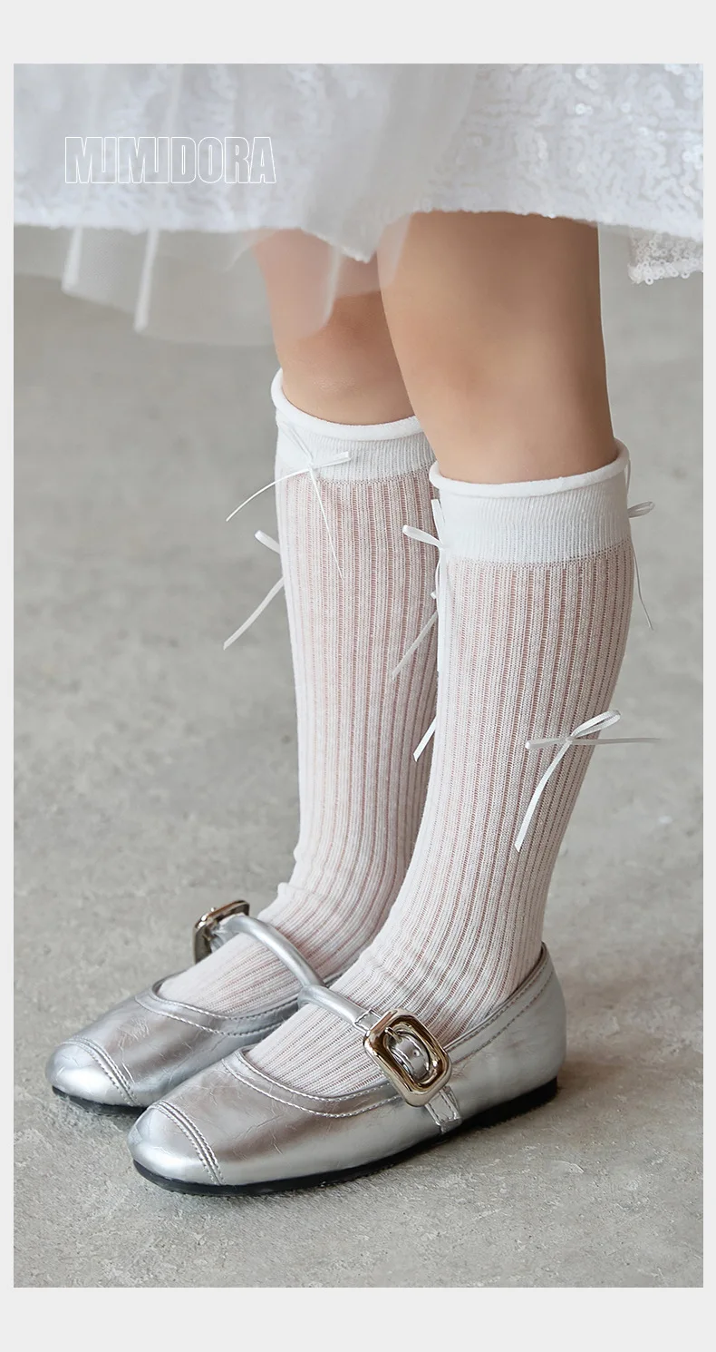 Calcetines finos para niños con diseño sencillo y lazo