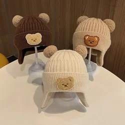 Gorro de lana con protección auditiva para bebé