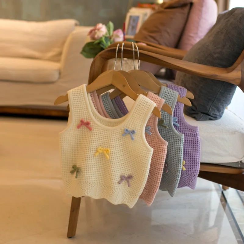 Jersey de punto con lazo para niña MILANCEL