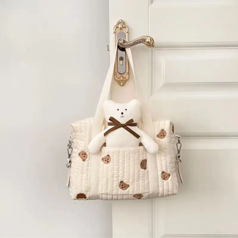 Bolsa de pañales impermeable y acolchada para bebé y mamá - imagen 2