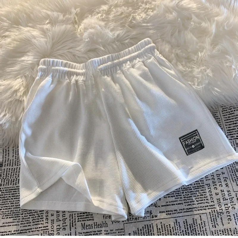 Pantalones cortos de pijama holgados con bolsillos en casa - imagen 4