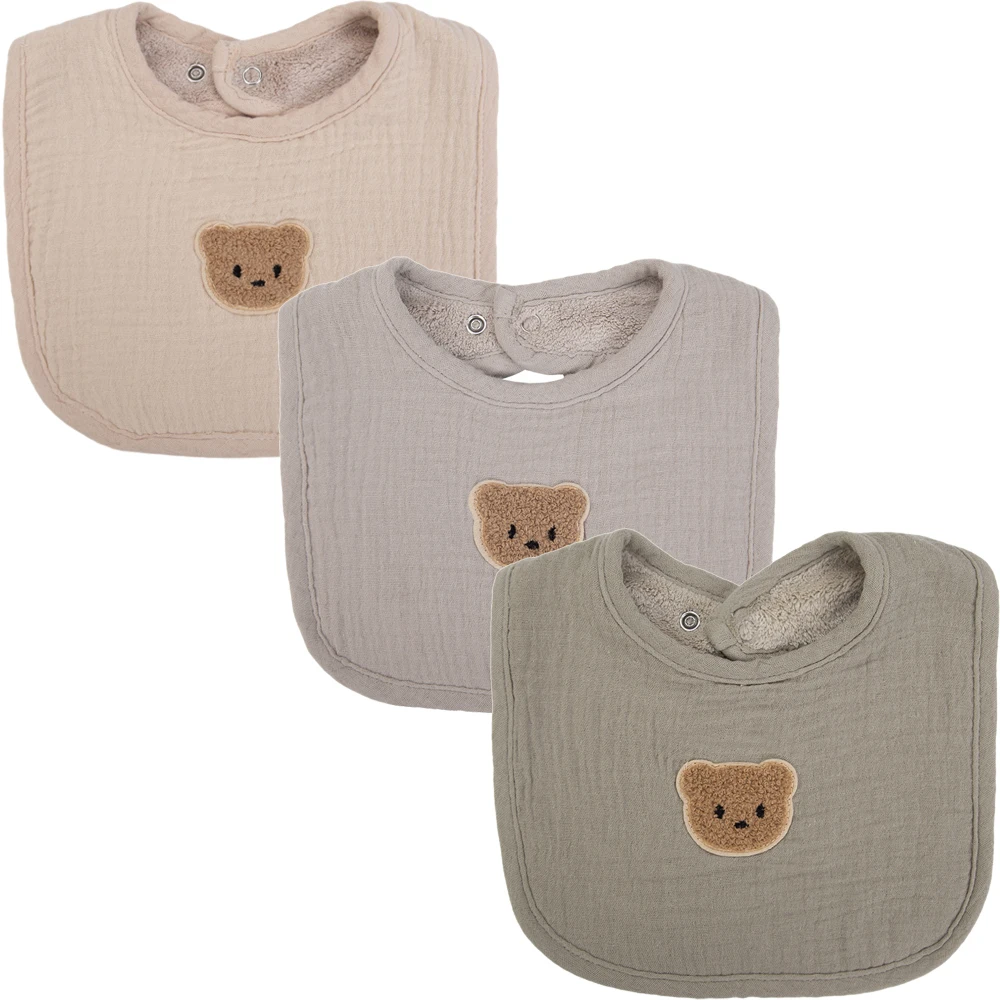 Baberos con estampados variados en ambas caras