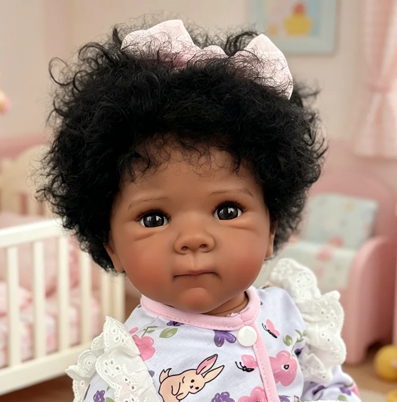 Muñeca Reborn Bettie Girl realista de vinilo con cabello rizado