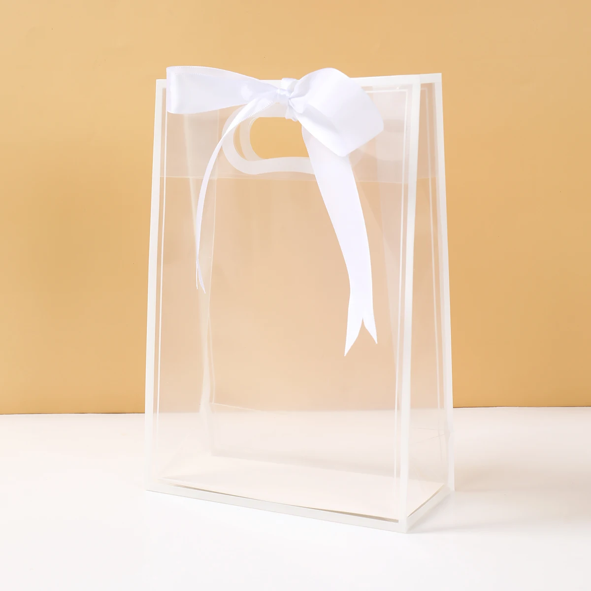 Bolsa transparente para golosinas bebé con cinta blanca