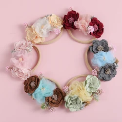 Diadema floral de gasa para bebé – Lazo elástico artesanal